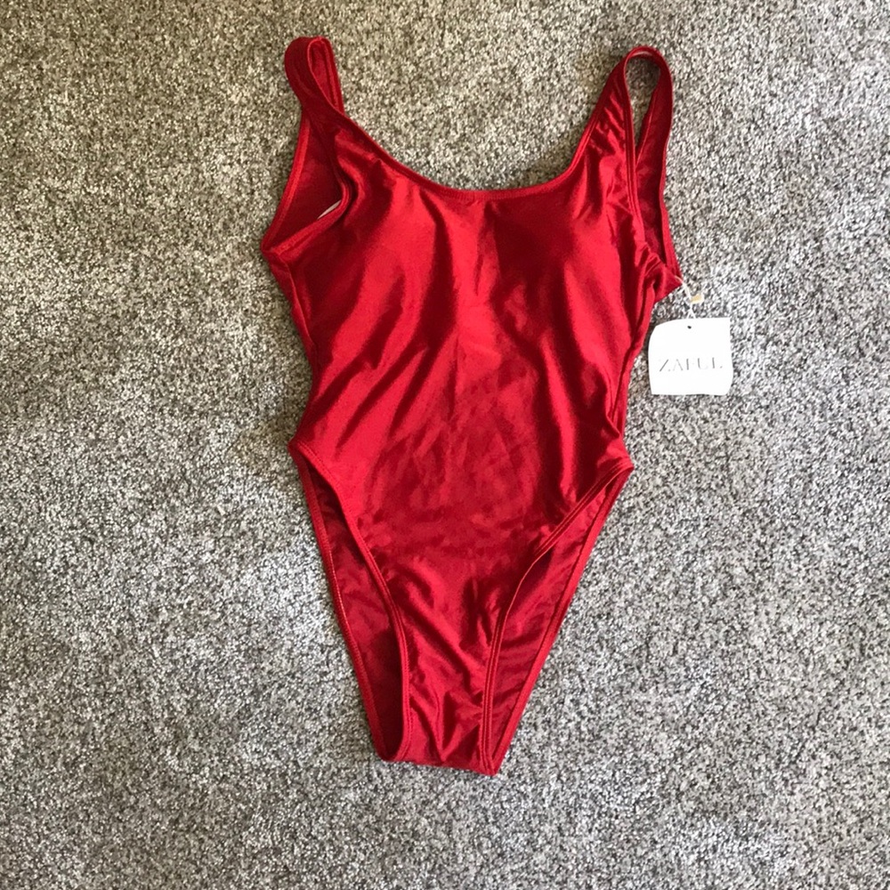 NEVER WORN one piece swimsuit.